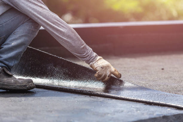 Professional Basement Waterproofing technician working in Chester, IL